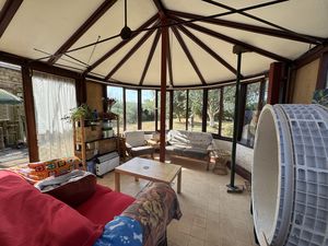 CONSERVATORY LEADING TO ENCLOSED PATIO- click for photo gallery